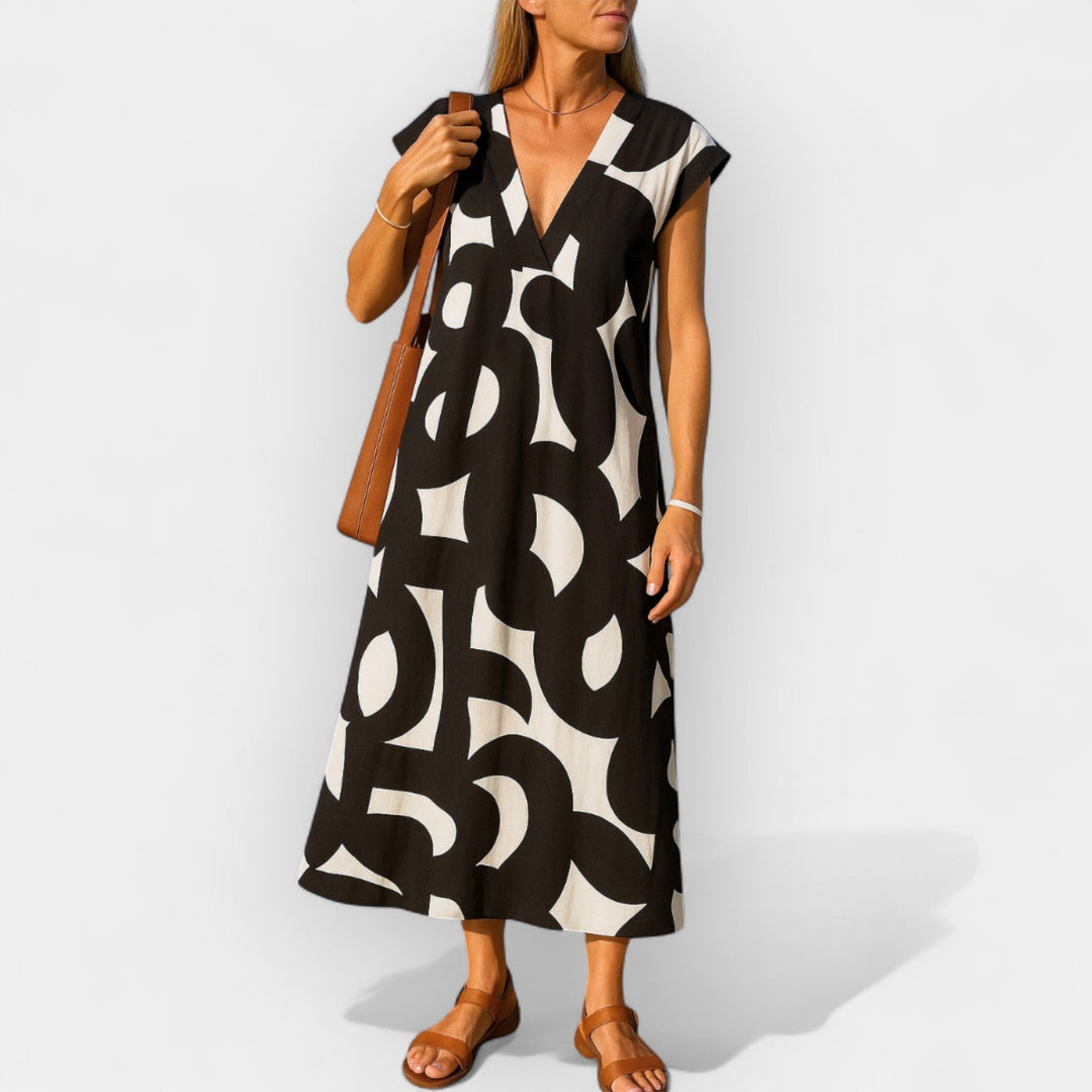 Aoibhinn – Sheer V-Neck Dress with Modern Design