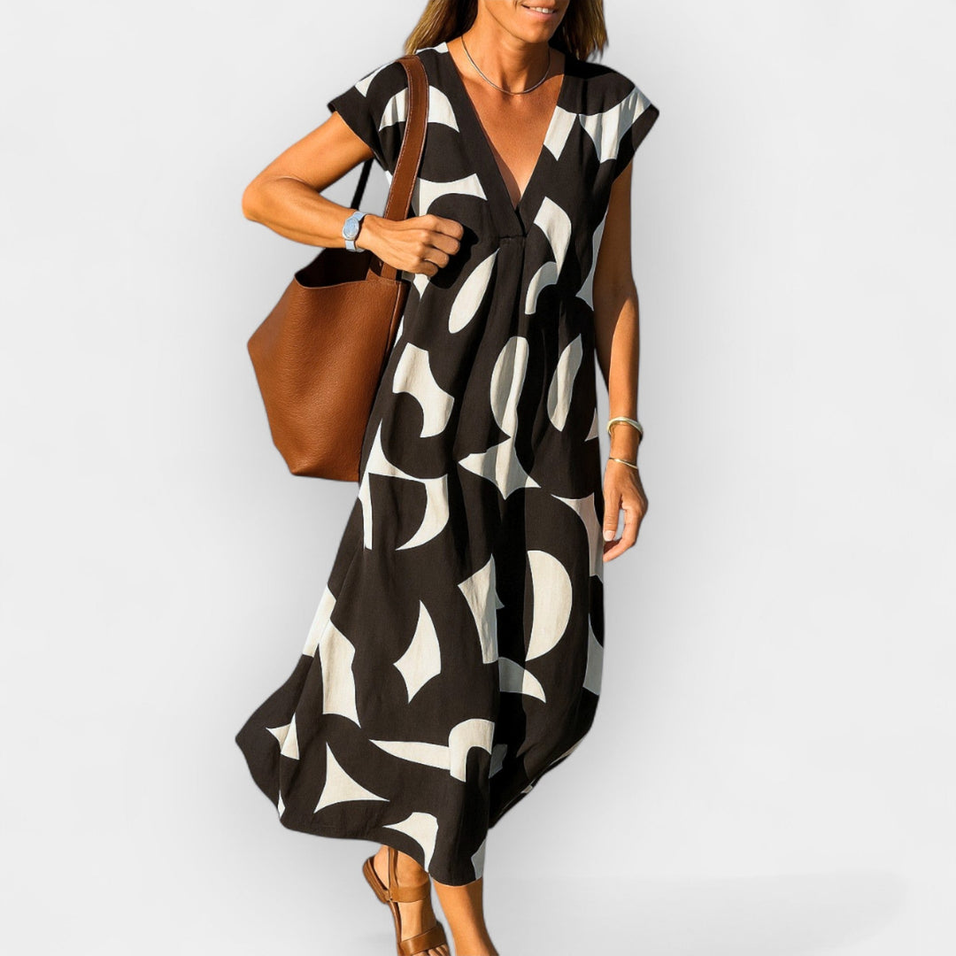 Aoibhinn – Sheer V-Neck Dress with Modern Design