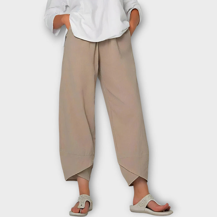 Ciara – Elegant Asymmetric-Hem Trousers