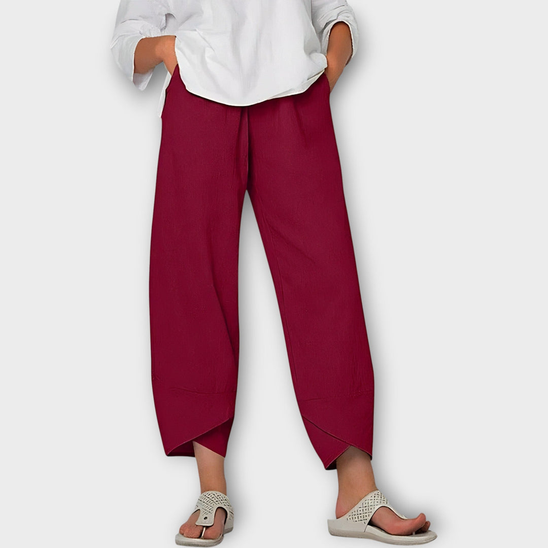 Ciara – Elegant Asymmetric-Hem Trousers