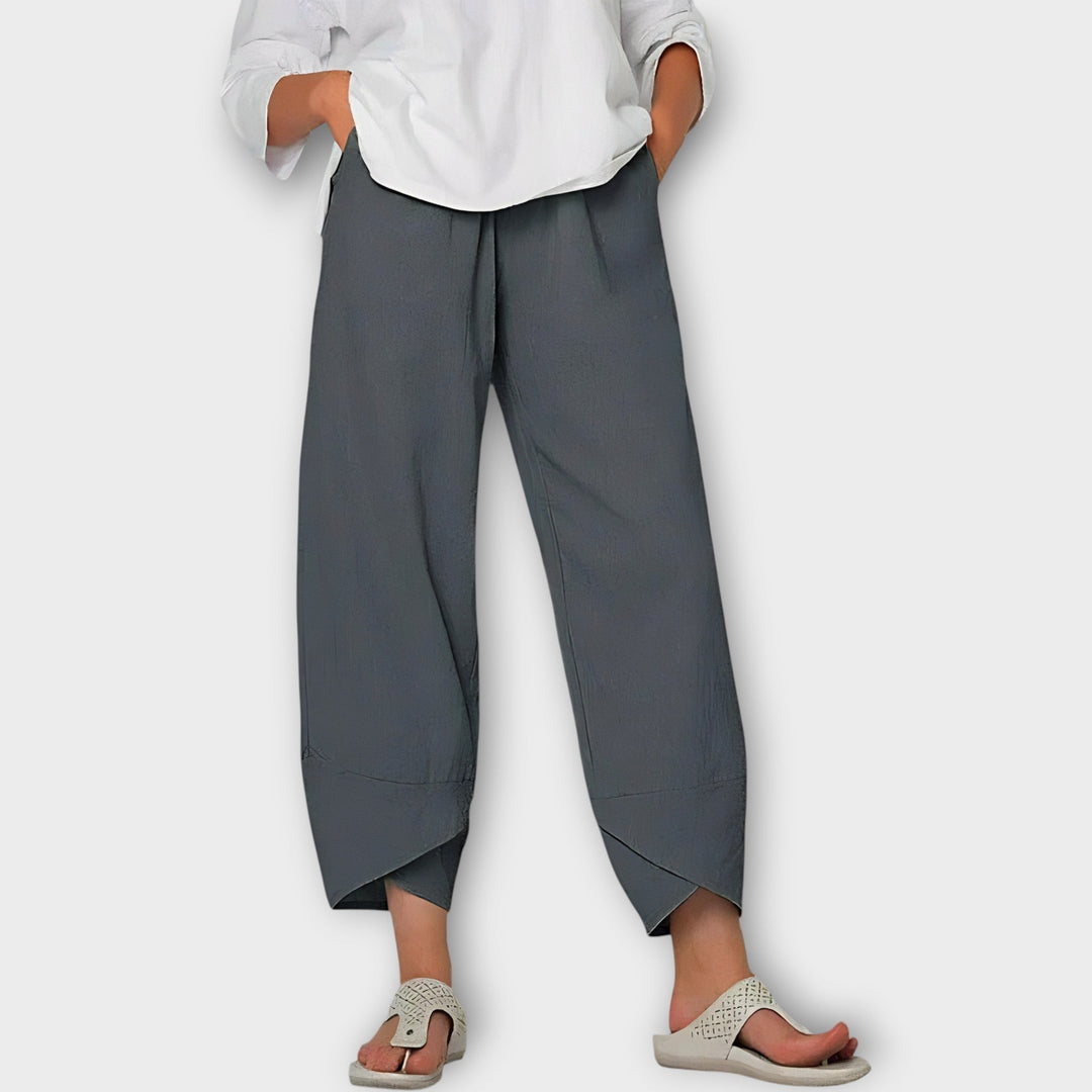 Ciara – Elegant Asymmetric-Hem Trousers